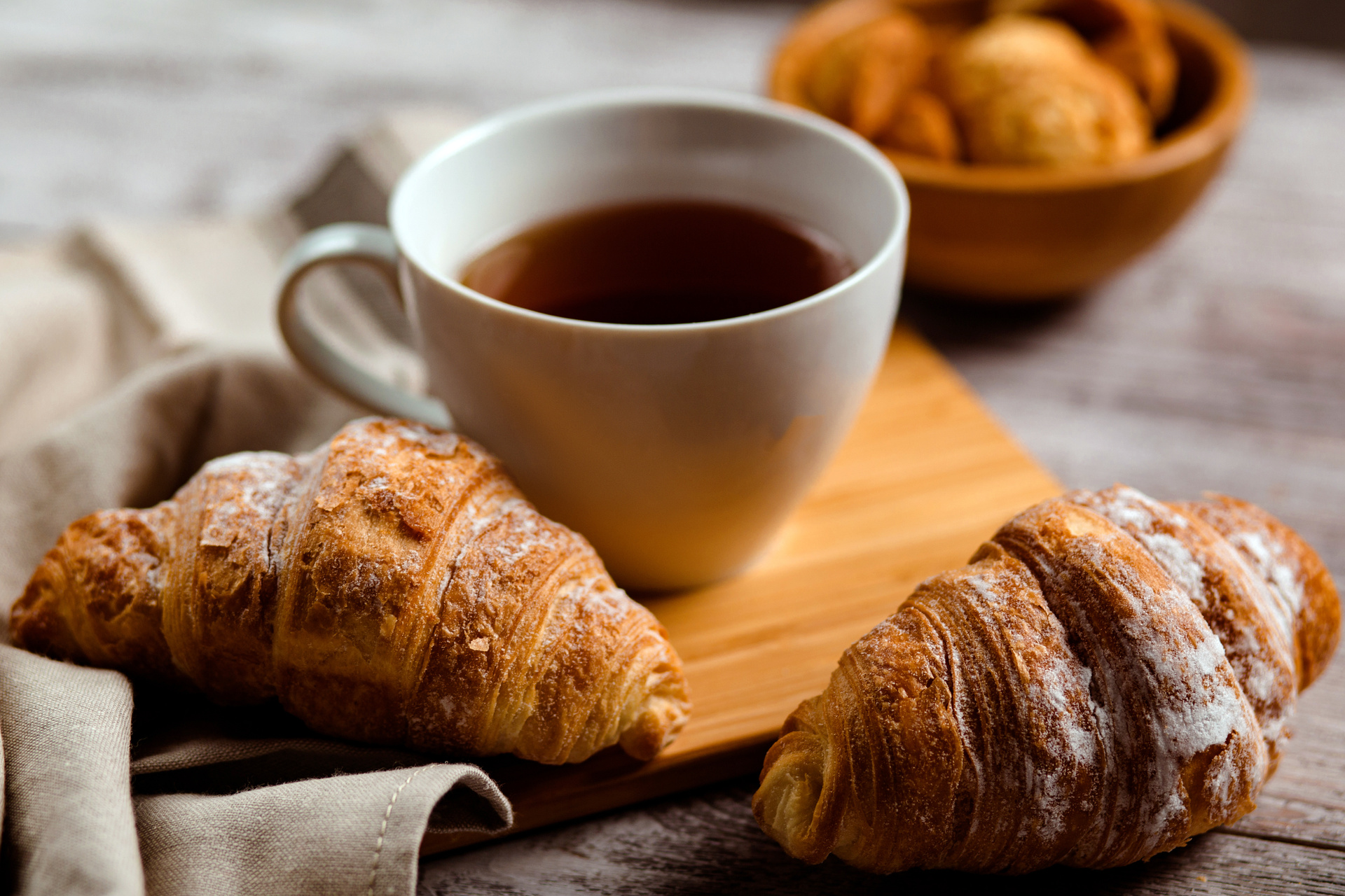Coffee served with fresh croissants at a bakery cafe